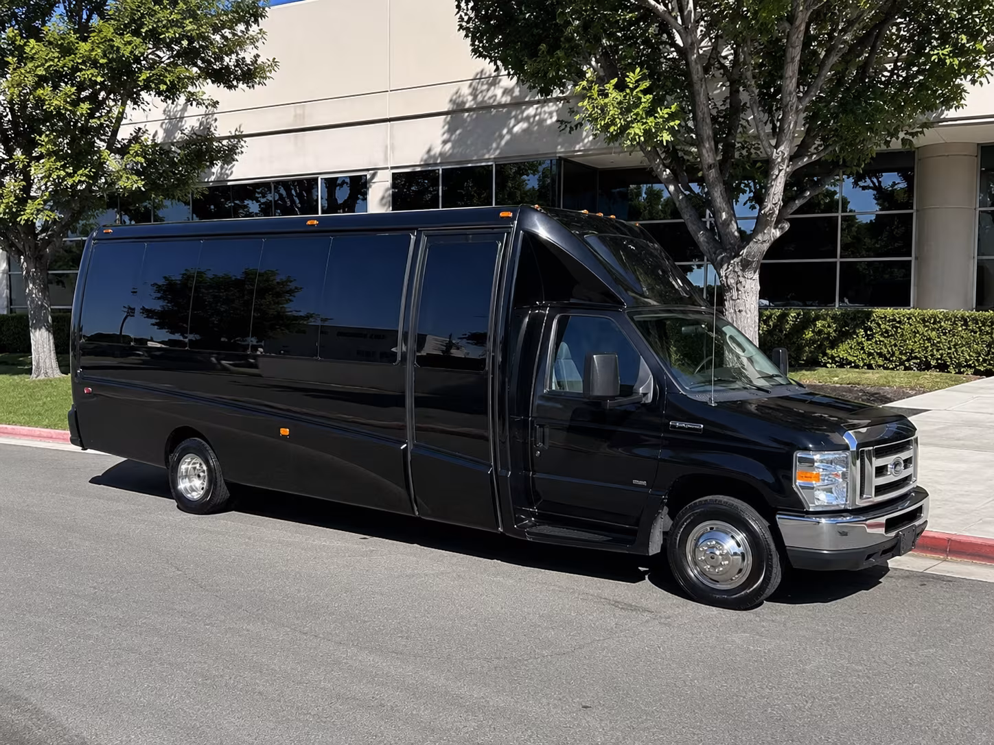 Wedding guests seated inside a party bus serving Atlanta